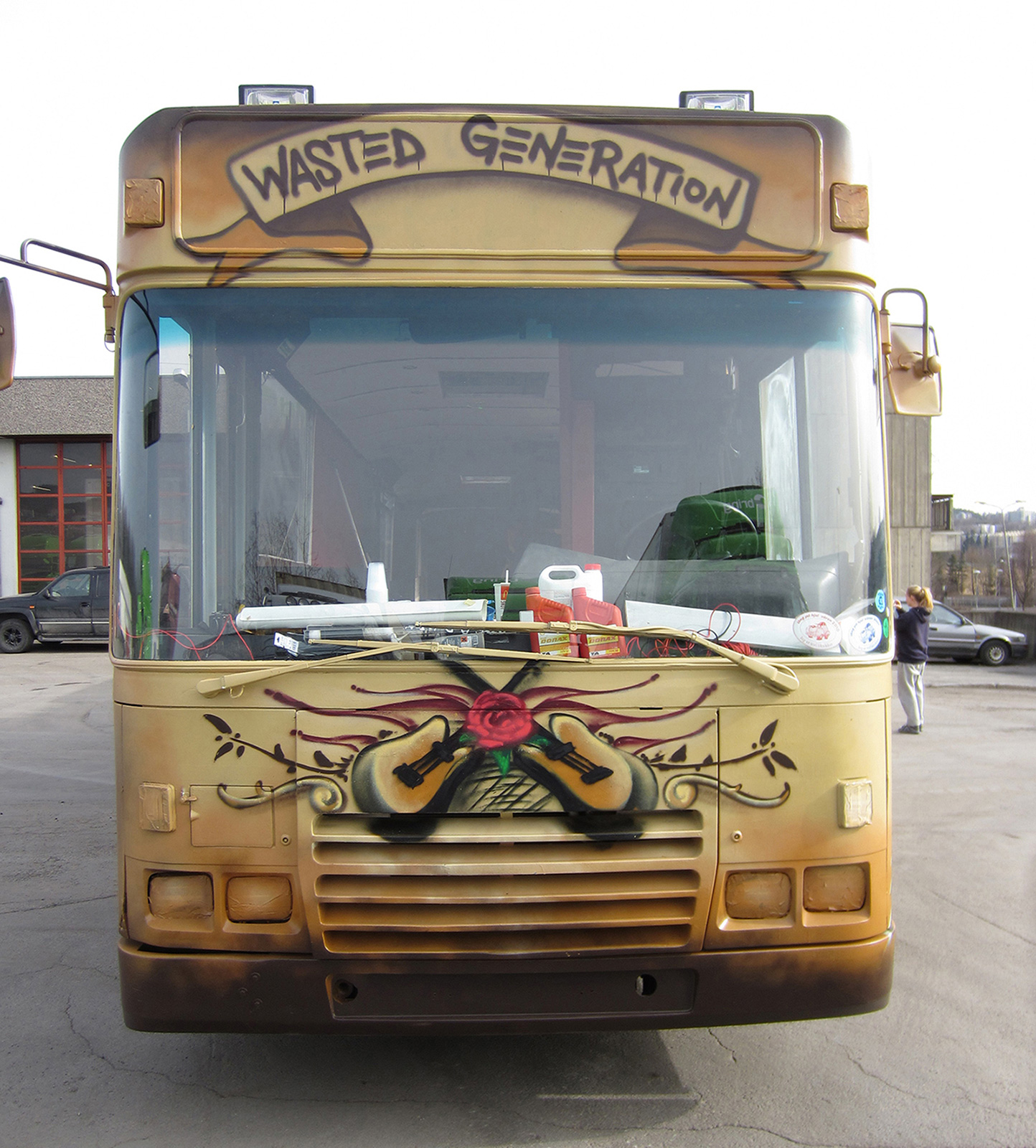 Wasted Generation rustic bus exterior designed graffiti style