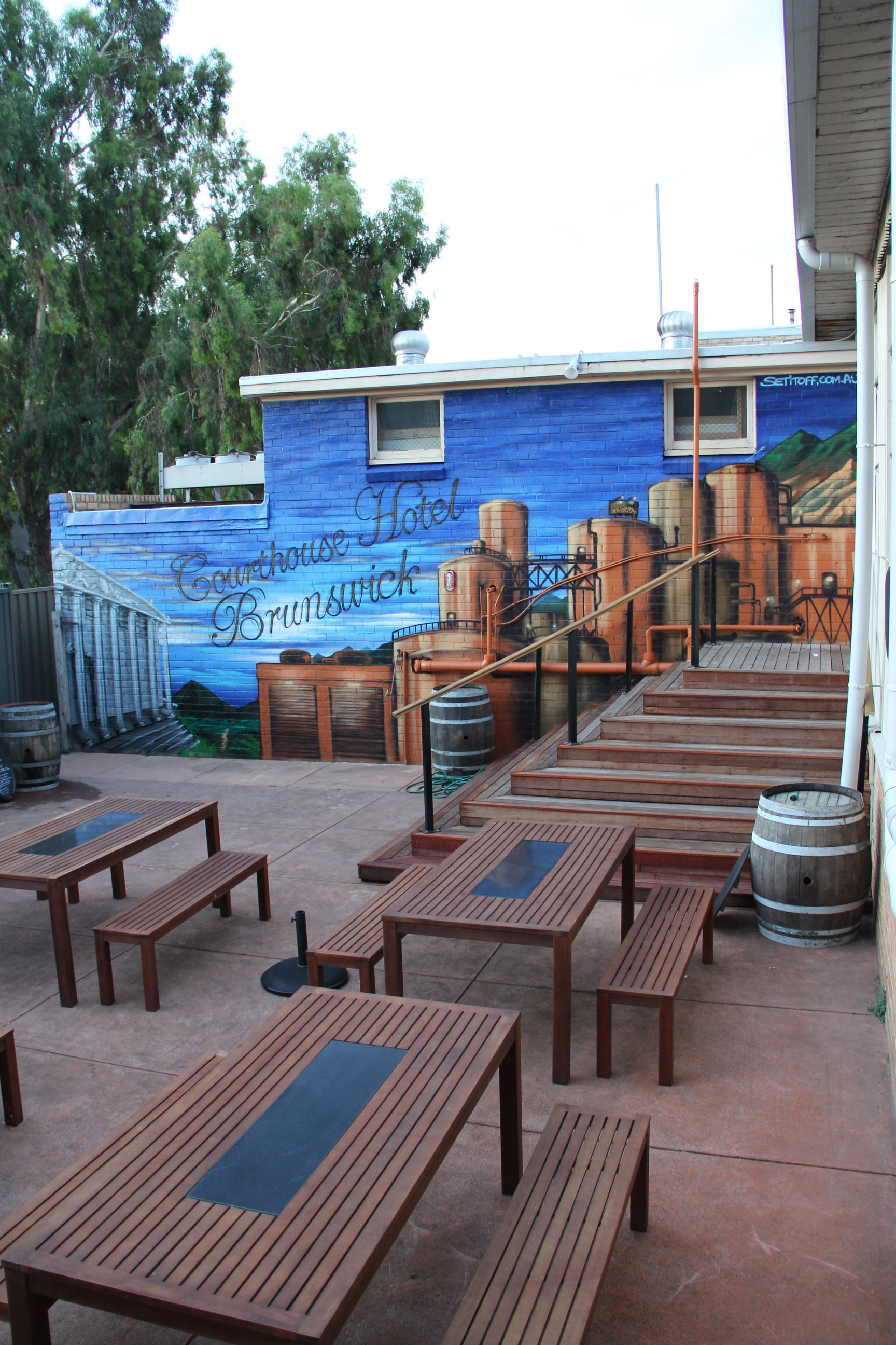 Courthouse hotel beer garden wall mural exterior