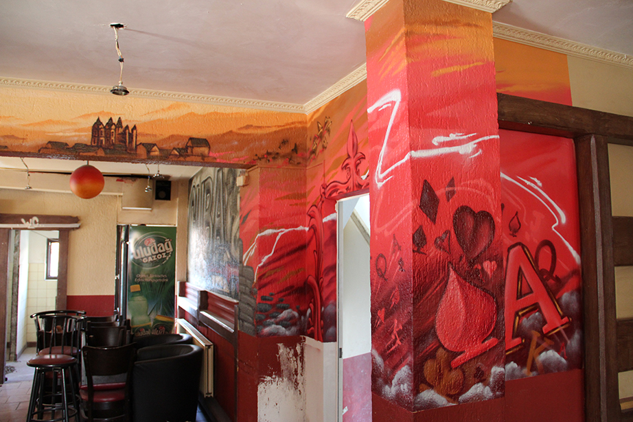 Limburg bar interior wall graffiti
