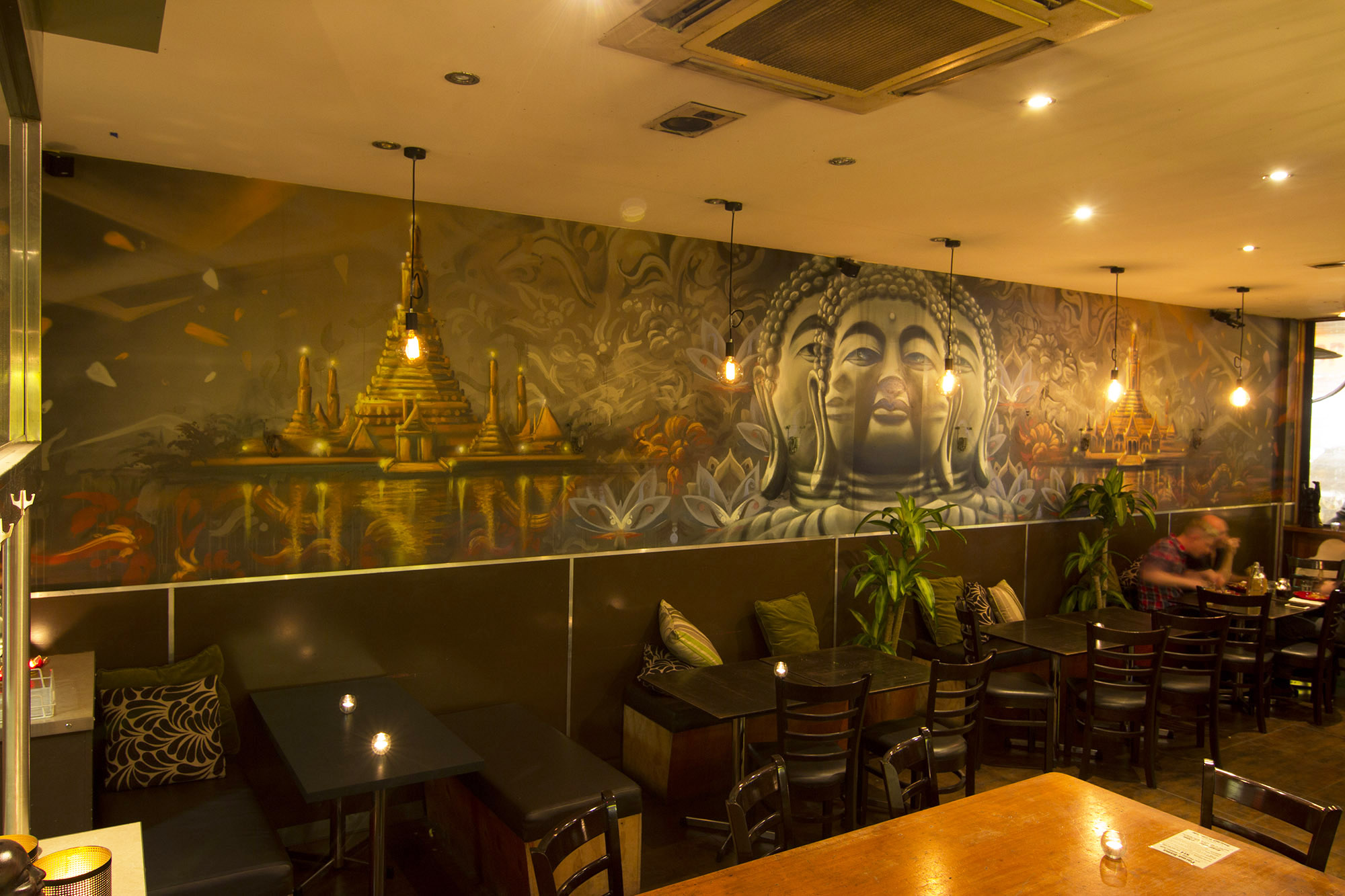 Buddhist themed graffiti in a restaurant