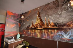 Buddhist themed graffiti in a restaurant