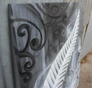All black feather on canvas in graffiti style