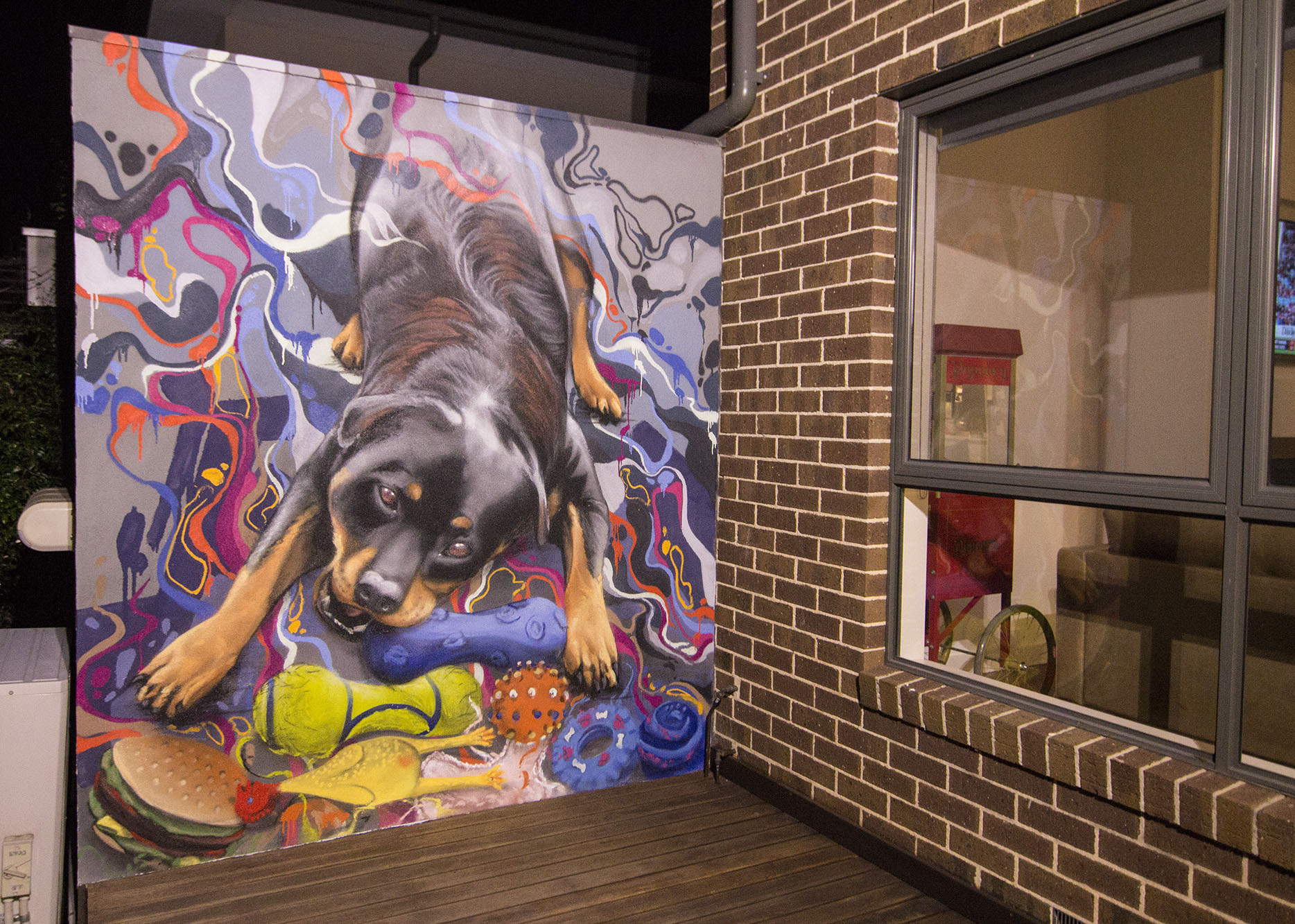 Graffiti mural of a dog