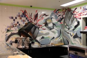 Graffiti backsplash in kitchen
