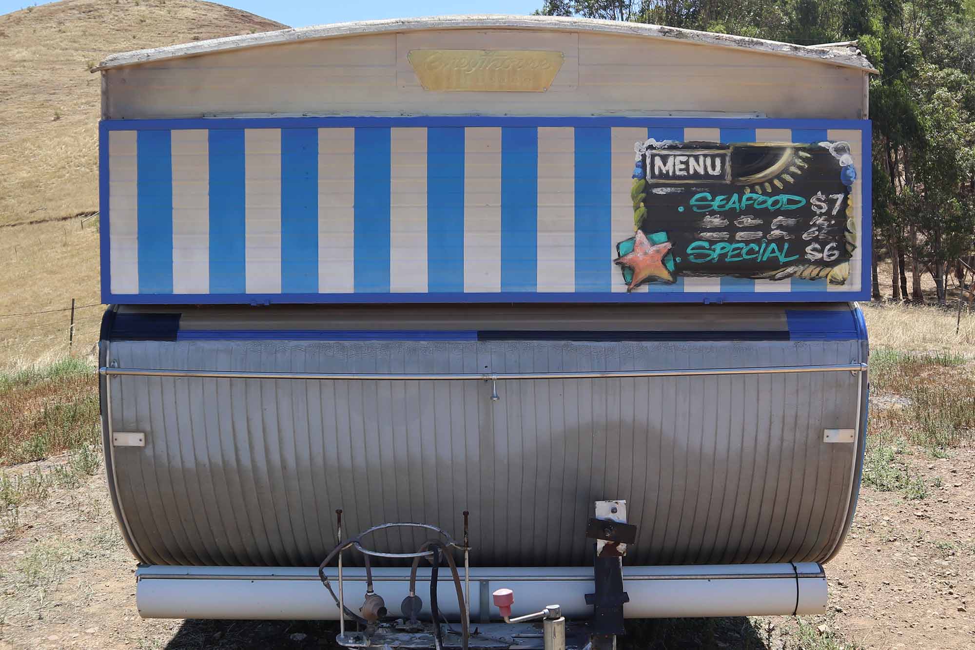 Fish n chips graffiti on a vintage food trailer